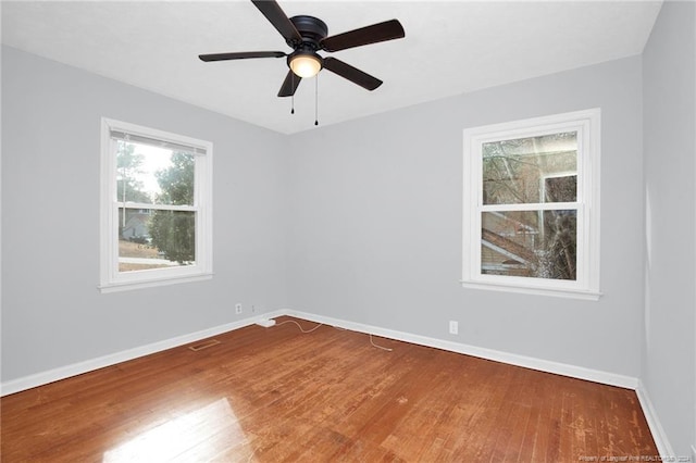 unfurnished room featuring ceiling fan and wood-type flooring