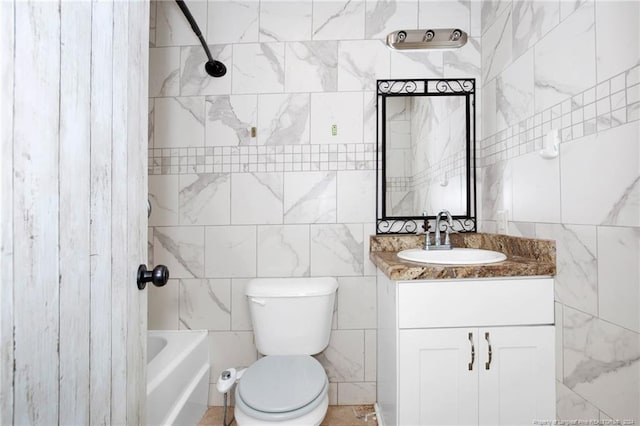 full bathroom with tiled shower / bath combo, toilet, and vanity