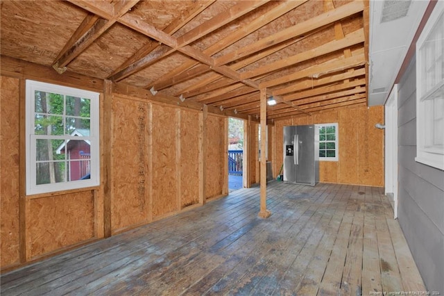 misc room featuring wood-type flooring and a wealth of natural light