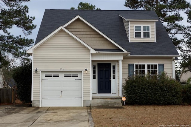 view of front of property featuring a garage