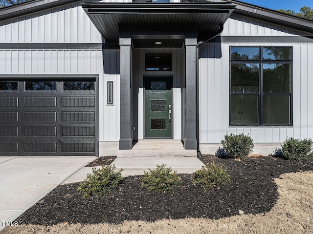 property entrance with a garage