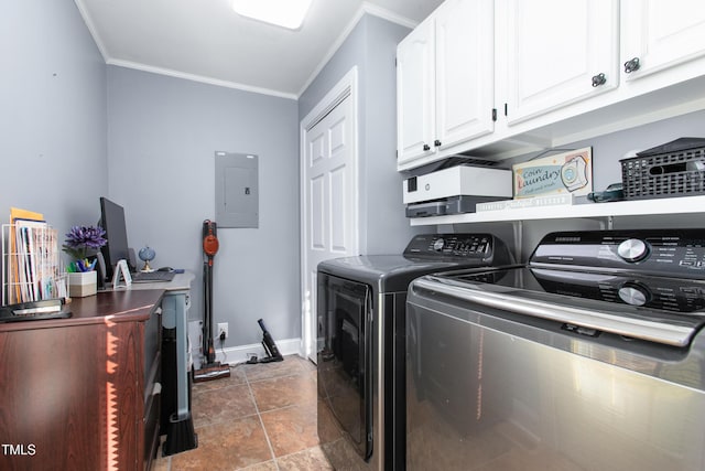 laundry area featuring cabinets, electric panel, crown molding, and washing machine and clothes dryer