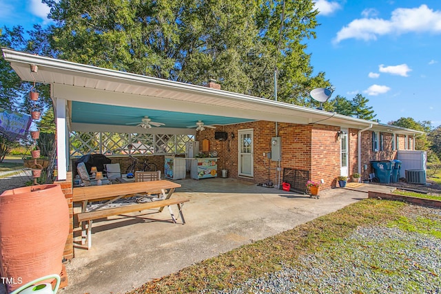 exterior space featuring central air condition unit and ceiling fan