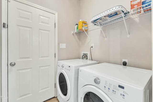 laundry room featuring washer and dryer