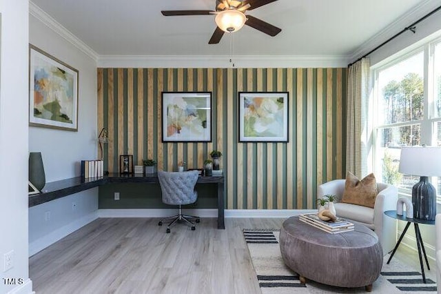 home office with ceiling fan, ornamental molding, and light hardwood / wood-style flooring