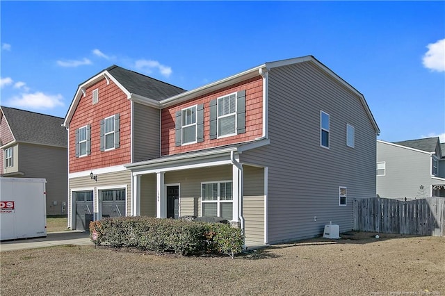 view of front of property with a garage