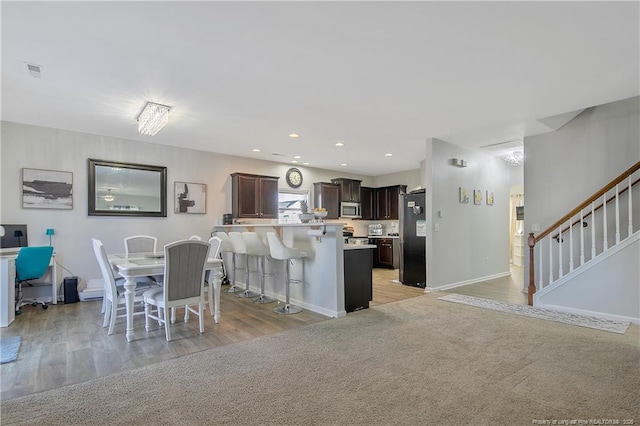 view of carpeted dining area