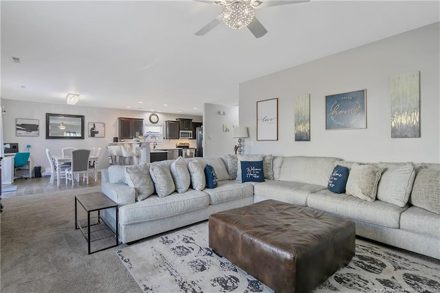 living room featuring ceiling fan