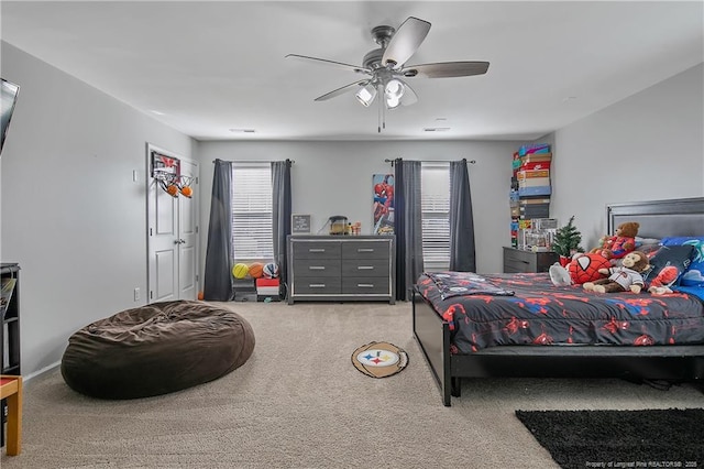 bedroom with carpet flooring and ceiling fan