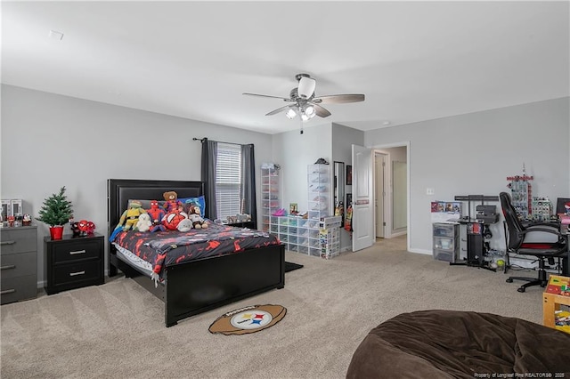 bedroom with ceiling fan and carpet