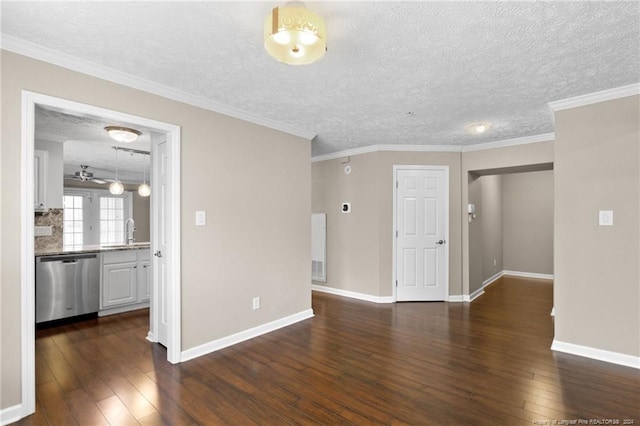 unfurnished room with ceiling fan, crown molding, sink, and dark wood-type flooring