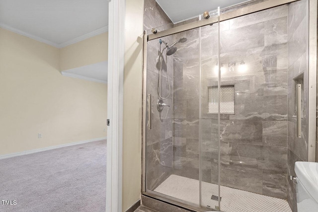 bathroom with toilet, ornamental molding, and walk in shower