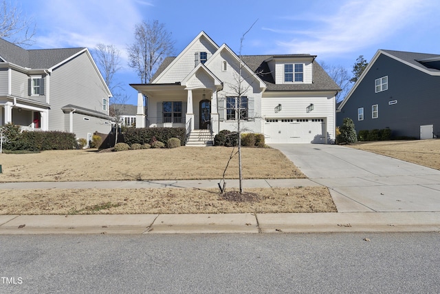 front facade featuring a porch and a garage