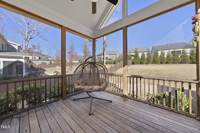 wooden deck featuring ceiling fan