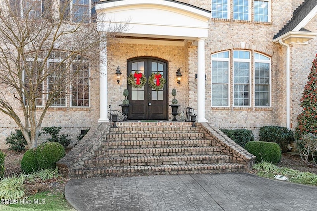 doorway to property with french doors