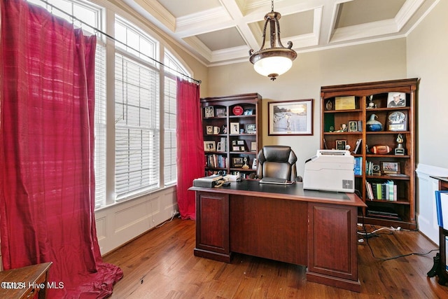 home office featuring coffered ceiling, dark hardwood / wood-style flooring, plenty of natural light, and ornamental molding