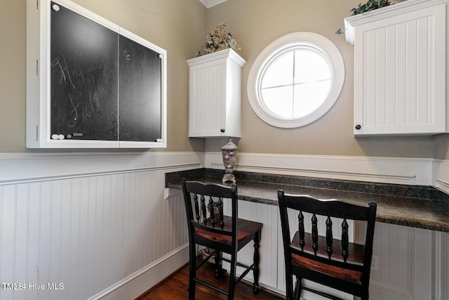 kitchen featuring white cabinets