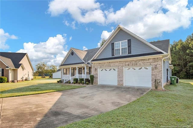 view of front of house featuring a garage and a front yard