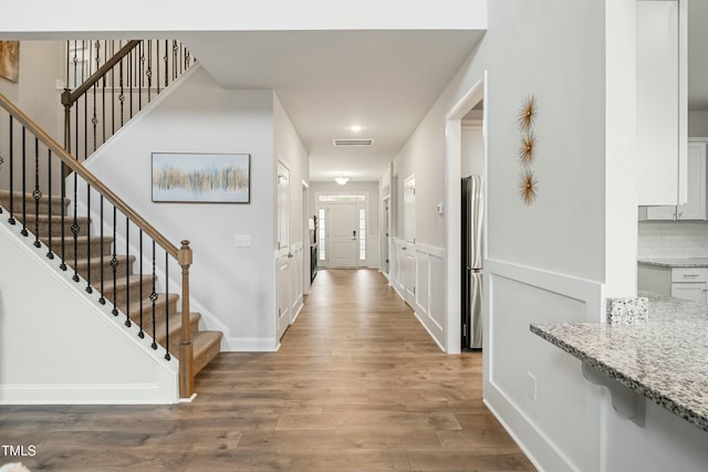 entryway featuring wood-type flooring