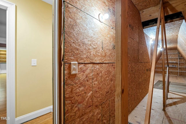 bathroom with hardwood / wood-style flooring