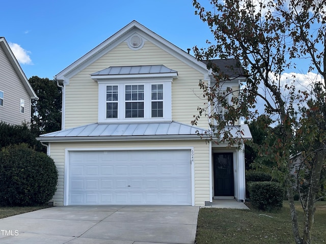 view of front property with a garage