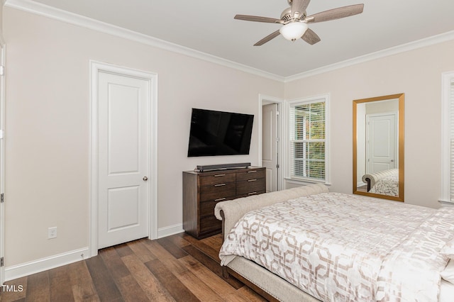 bedroom featuring dark hardwood / wood-style floors, ceiling fan, and ornamental molding