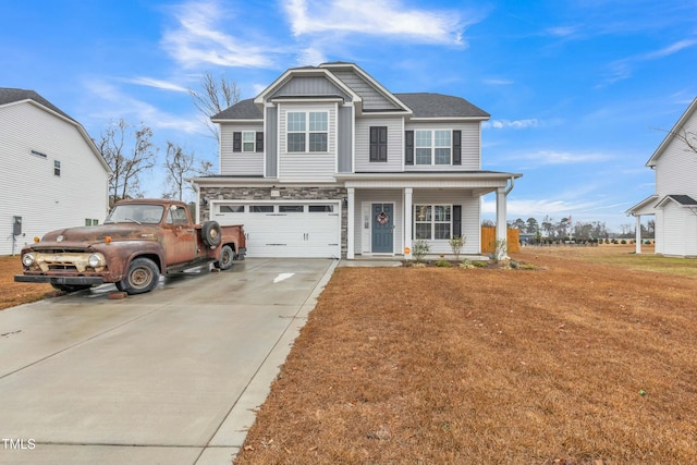 view of front of property with a garage, a porch, a front lawn, and concrete driveway