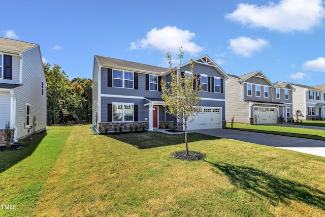 view of front facade with a garage and a front lawn