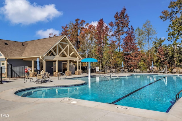 view of swimming pool featuring a patio