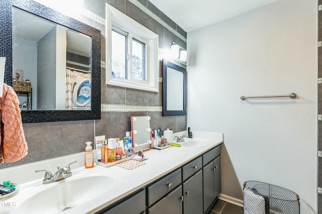 bathroom featuring tile patterned floors and vanity