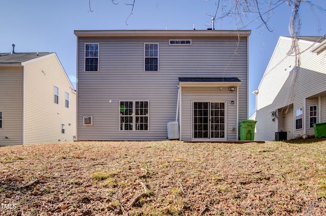 back of property with central air condition unit