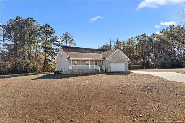 view of front of house featuring a garage and covered porch