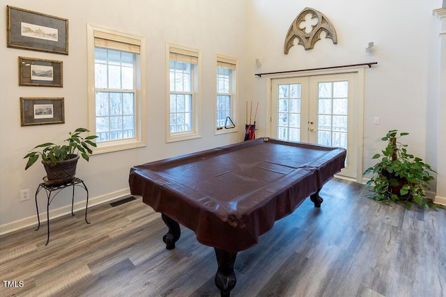 rec room featuring french doors, hardwood / wood-style flooring, and billiards