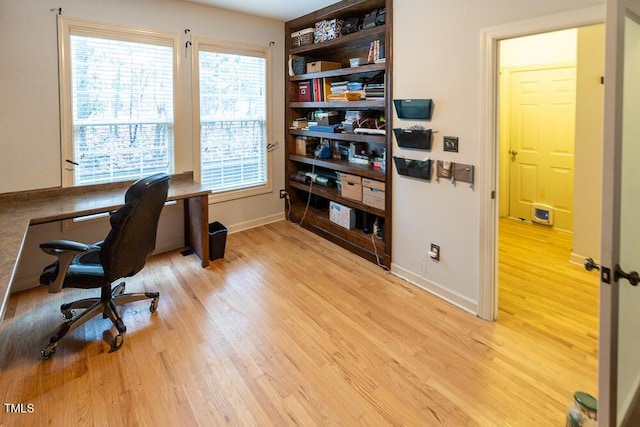 office space featuring light hardwood / wood-style floors