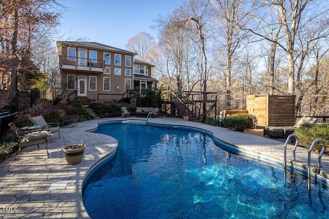 view of pool with a patio