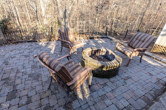 view of patio featuring an outdoor fire pit