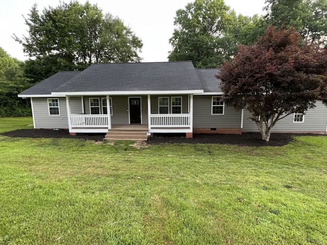 view of front of home featuring covered porch and a front lawn