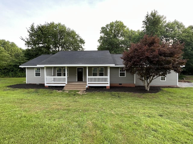 ranch-style house with a front yard and a porch