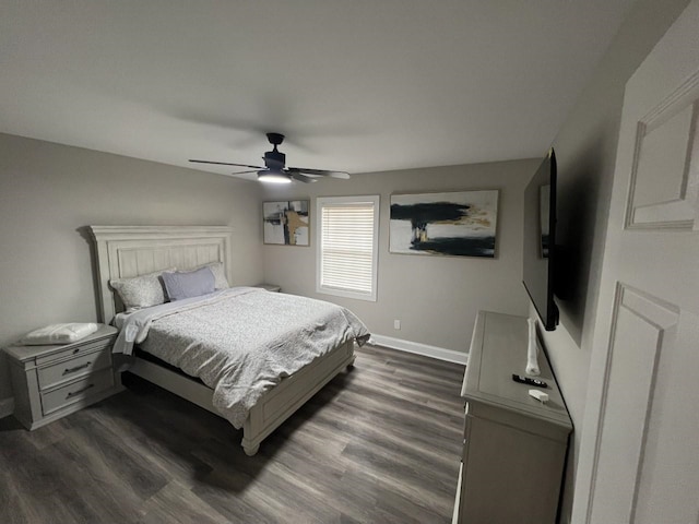 bedroom featuring ceiling fan and dark hardwood / wood-style flooring