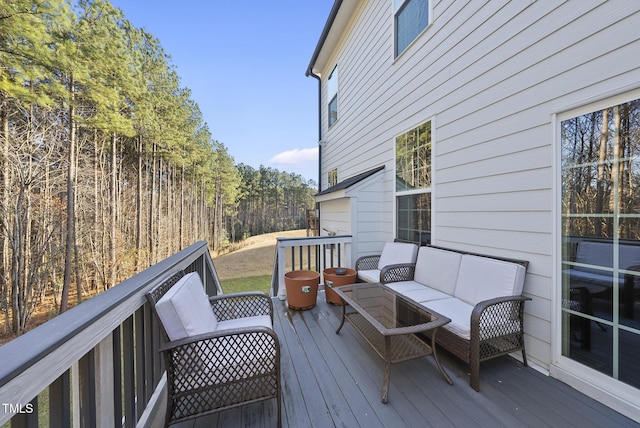 deck with an outdoor living space