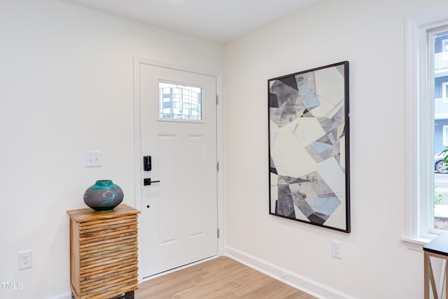 entrance foyer with light wood-type flooring