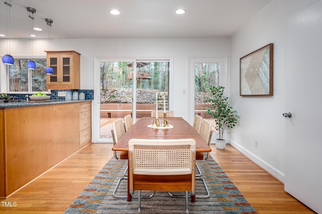 dining room with light hardwood / wood-style floors