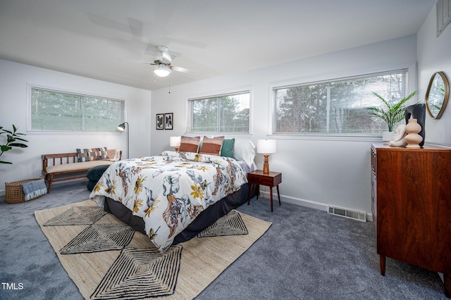 carpeted bedroom featuring ceiling fan