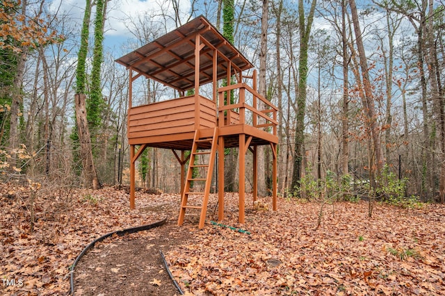 view of outdoor structure with a playground