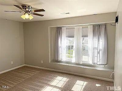 spare room featuring ceiling fan