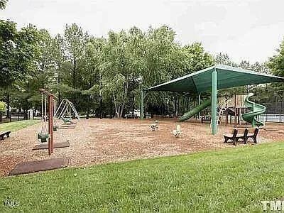 view of jungle gym with a lawn