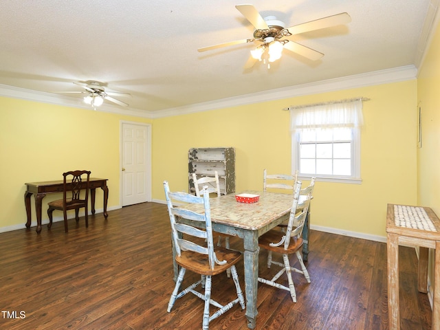 dining room with ceiling fan, dark hardwood / wood-style flooring, and ornamental molding