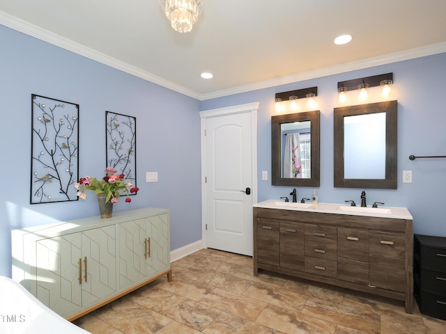 bathroom with vanity and crown molding