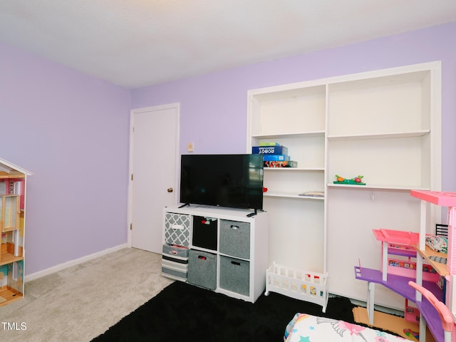 game room featuring light colored carpet