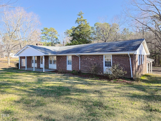 ranch-style house with a front yard